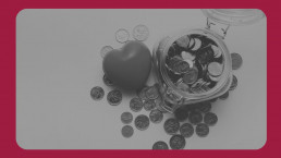 Model heart next to jar of coins